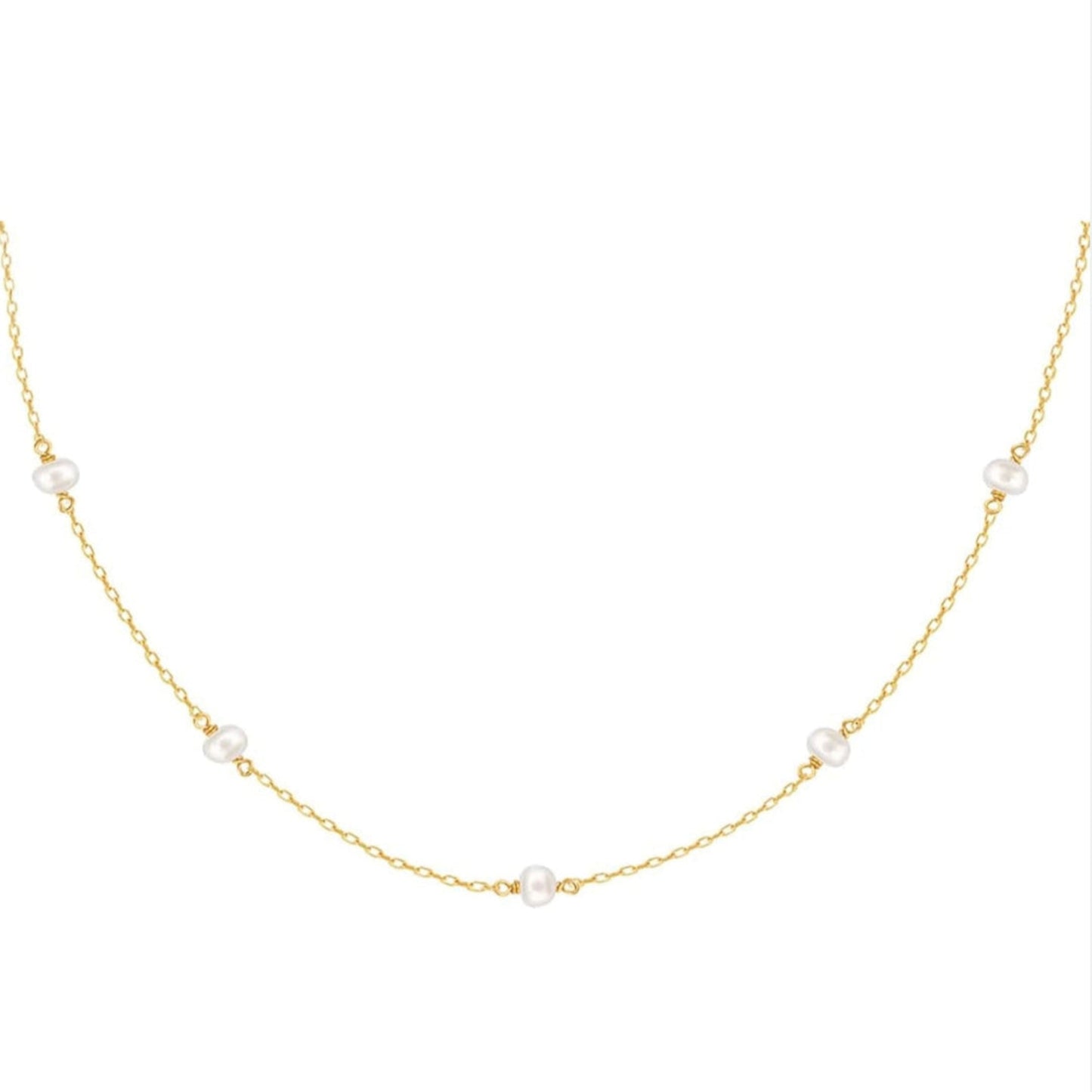 Gold necklace with pearls on a white background