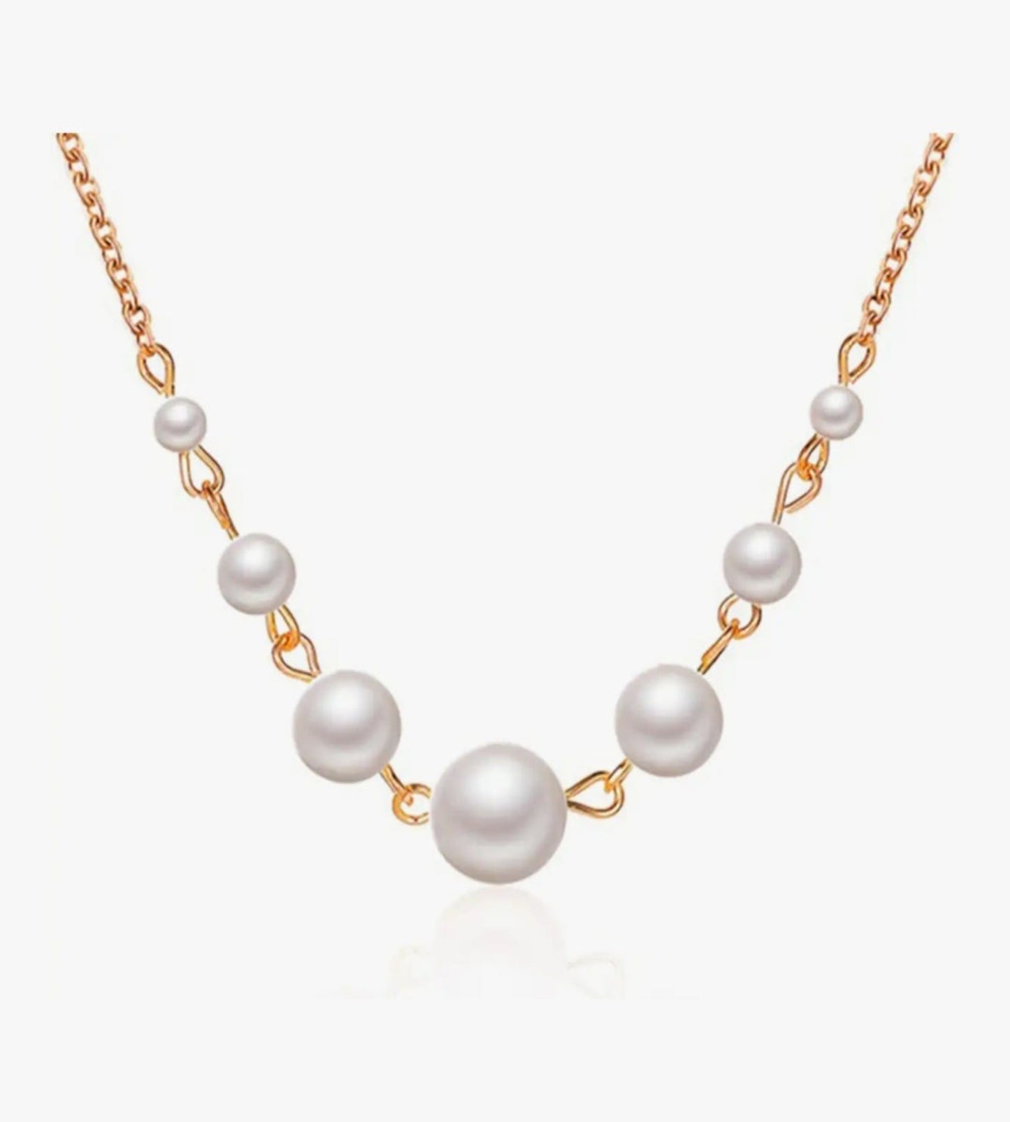 Elegant Chain Necklace with Graduated Pearl Accents