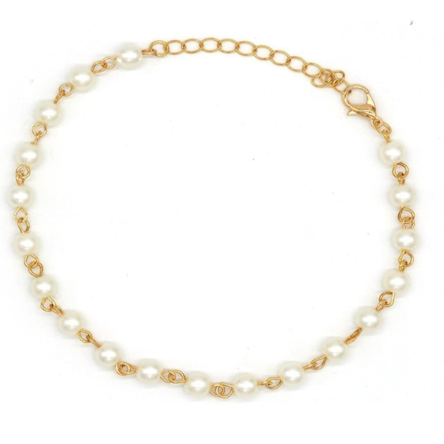 Gold and pearl necklace on a white background