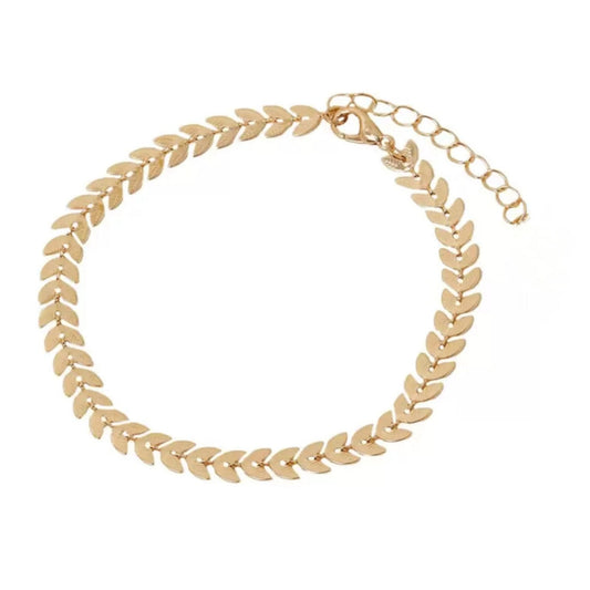 Gold leaf bracelet on a white background