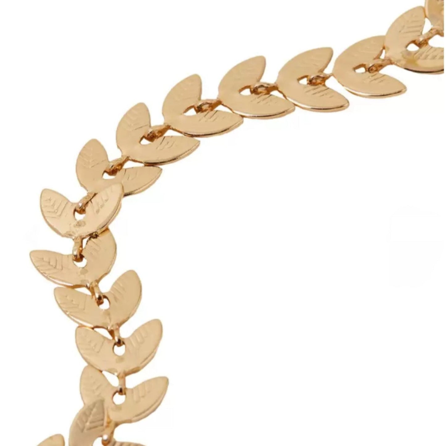 Gold chain bracelet on a white background