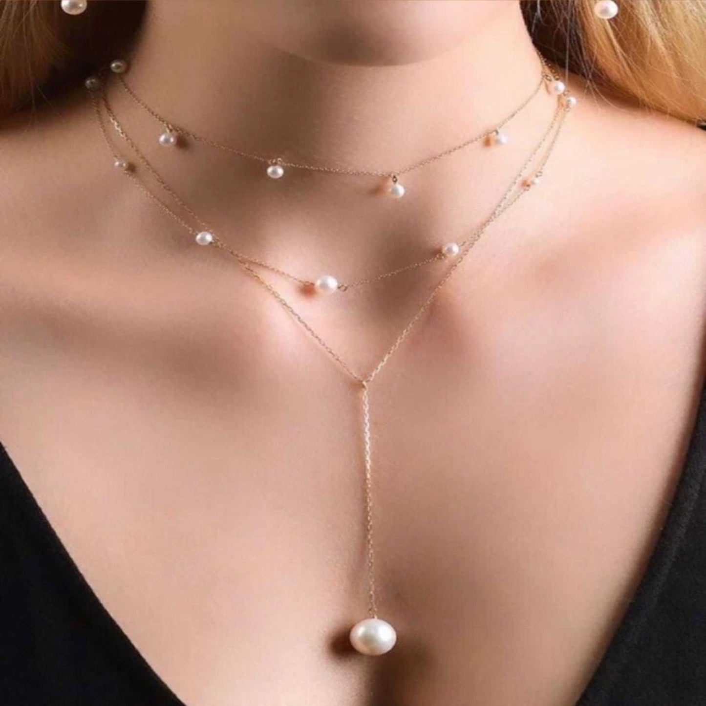 Pearl necklace on a model with a blurred background