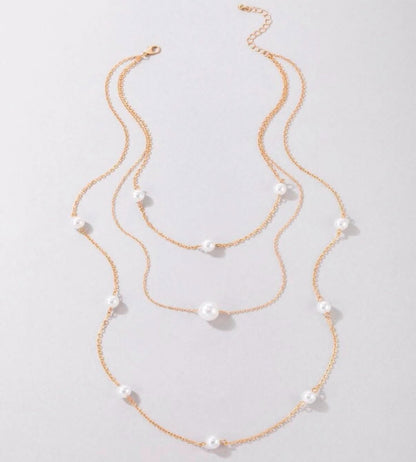 Cascading Elegance Multi-Layered Pearl Necklace